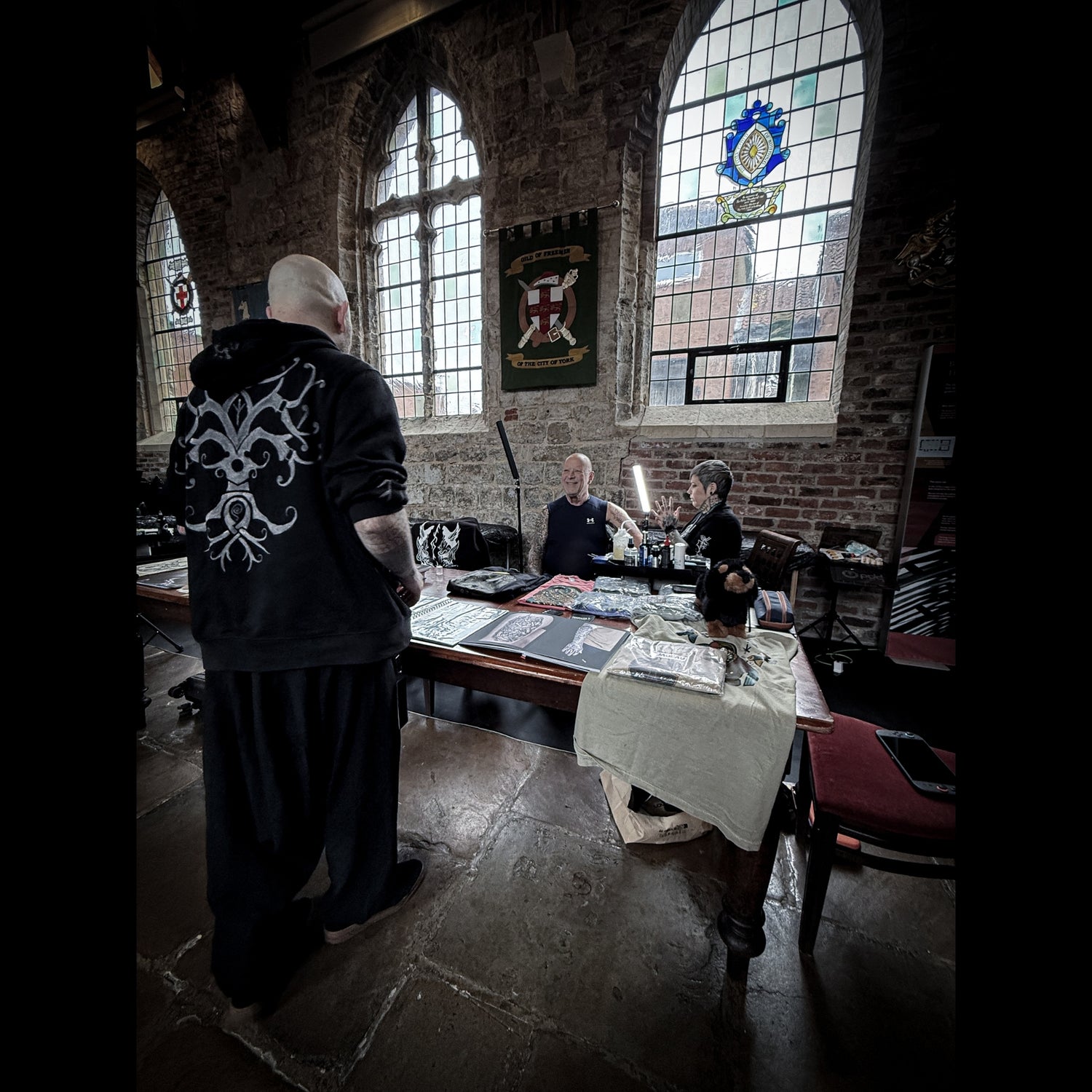 Hélène Morrigan tattooing at Jorvik Tattoo Moot 2026 in York, showcasing her Norse mythology and Viking art style