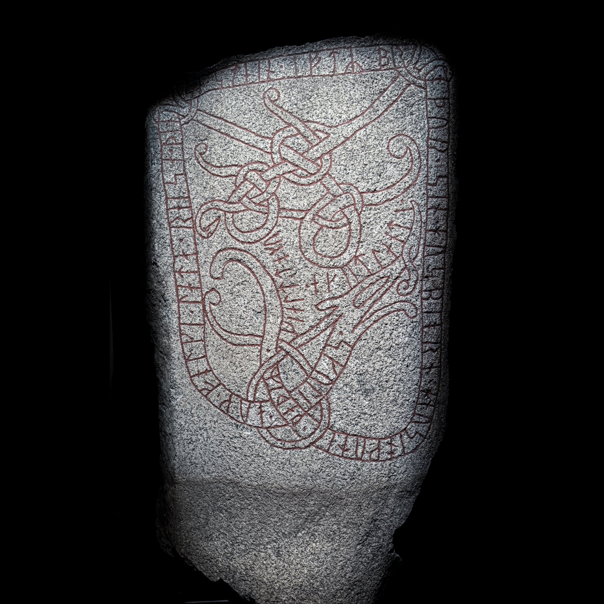 Scandinavian runestone displayed at Historiska Museet in Stockholm, Sweden, carved with Younger Futhark runes
